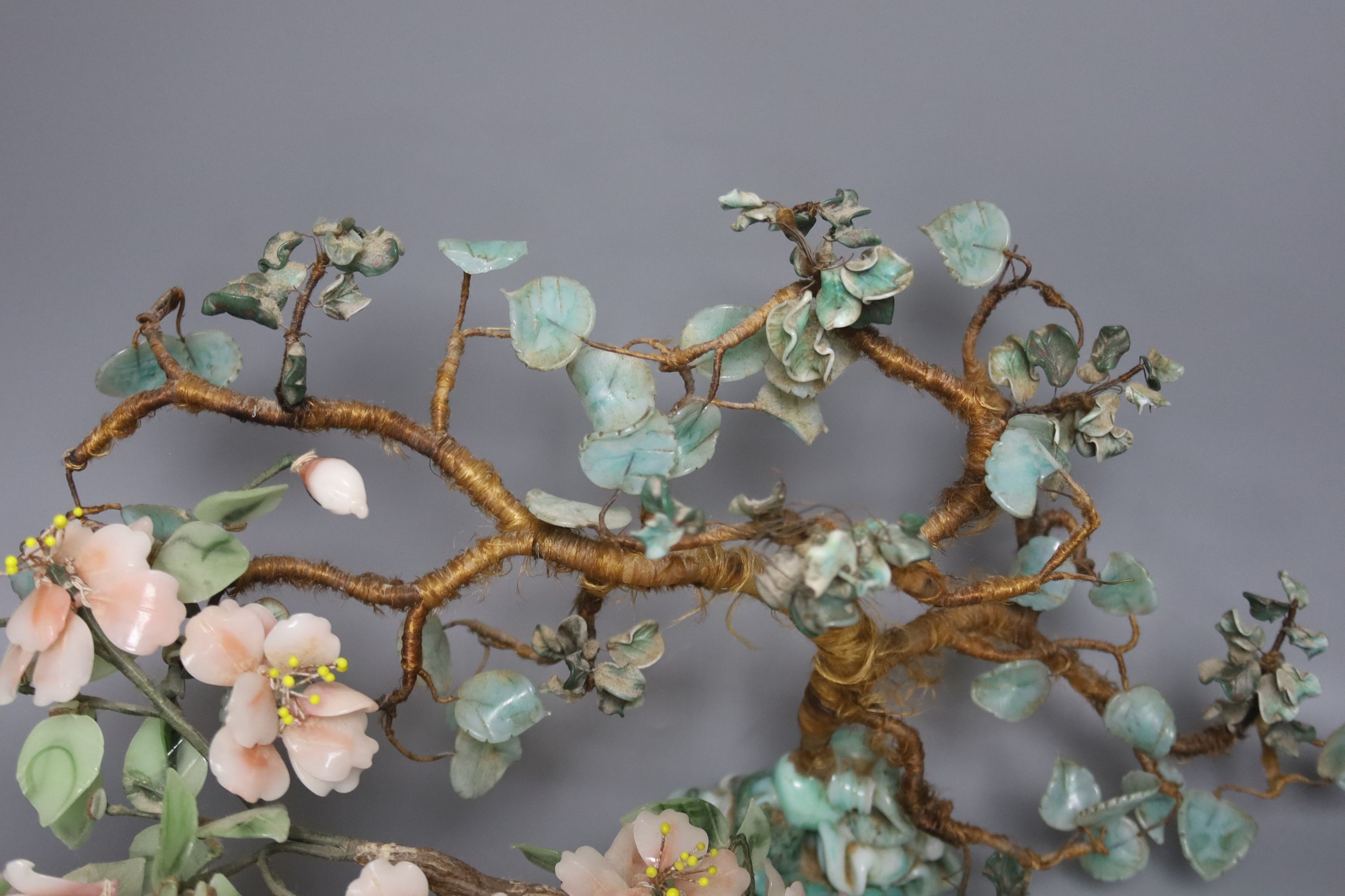 A pair of Chinese glass models of trees, tallest 29 cm